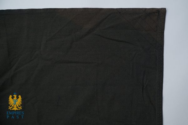 Black fabric swatch with a blue-and-gold eagle emblem and the words 'EMPIRES PAST' in blue at the lower-left corner.