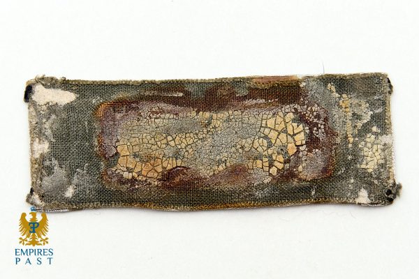 Empires Past 20257370 - Empires Past Frayed rectangular textile fragment with a crackled decorative pattern in gray and brown.